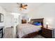 Comfortable bedroom with a king-size bed and en-suite bathroom access at 18520 Oak Way Dr, Hudson, FL 34667