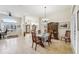 Bright dining room featuring a wood hutch and tile flooring at 18520 Oak Way Dr, Hudson, FL 34667