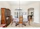 Spacious dining area with a large hutch and window at 18520 Oak Way Dr, Hudson, FL 34667