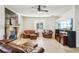 Living room with a fireplace and leather furniture at 18520 Oak Way Dr, Hudson, FL 34667