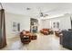 Relaxing living room with leather sofas and a fireplace at 18520 Oak Way Dr, Hudson, FL 34667