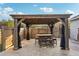 Relaxing patio gazebo with seating area at 18520 Oak Way Dr, Hudson, FL 34667