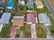 Aerial view highlighting a reddish-brown roofed house in a residential area at 1885 Mississippi Ne Ave, St Petersburg, FL 33703