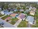 Aerial view showcasing a teal and brown home amongst other houses at 1885 Mississippi Ne Ave, St Petersburg, FL 33703
