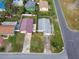 An aerial view of two houses, one with a gray roof and the other with a reddish-brown roof at 1885 Mississippi Ne Ave, St Petersburg, FL 33703