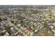 Aerial view of a house in a large residential neighborhood near the water at 1885 Mississippi Ne Ave, St Petersburg, FL 33703