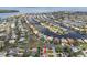 Aerial view of a house and surrounding neighborhood, showcasing waterfront and canal access at 1885 Mississippi Ne Ave, St Petersburg, FL 33703