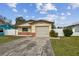 Brick ranch home with attached garage and driveway at 1885 Mississippi Ne Ave, St Petersburg, FL 33703