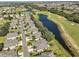 Aerial view of the community with golf course and lake views at 2019 Acadia Greens Dr # 34, Sun City Center, FL 33573