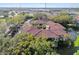 Aerial view of building showcasing red tile roofs at 2650 Countryside Blvd # C309, Clearwater, FL 33761