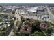 Aerial view showcasing the community's proximity to a large shopping mall and major roadways at 2650 Countryside Blvd # C309, Clearwater, FL 33761
