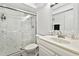 Updated bathroom with marble shower and vanity at 2650 Countryside Blvd # C309, Clearwater, FL 33761