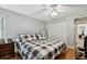 Spacious bedroom with king-size bed and ample closet space at 2650 Countryside Blvd # C309, Clearwater, FL 33761