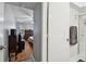 View of bedroom and bathroom from hallway at 2650 Countryside Blvd # C309, Clearwater, FL 33761