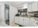 Kitchen with granite countertop and dishwasher at 2650 Countryside Blvd # C309, Clearwater, FL 33761