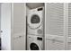 Stackable washer and dryer in a closet at 2650 Countryside Blvd # C309, Clearwater, FL 33761