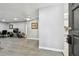 Living room with gray walls, wood-look floors, and comfy armchairs at 2650 Countryside Blvd # C309, Clearwater, FL 33761