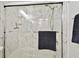 Shower stall with marble tile and glass enclosure at 2650 Countryside Blvd # C309, Clearwater, FL 33761
