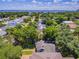 Aerial view showcasing the home's location near the bay and other houses at 2926 W Alline Ave, Tampa, FL 33611