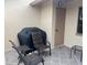 Relaxing back patio with seating and grill at 38245 Ironwood Pl # 0, Zephyrhills, FL 33542