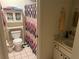 Clean bathroom with shower, toilet and vanity at 38245 Ironwood Pl # 0, Zephyrhills, FL 33542