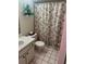 Clean bathroom with shower/tub and updated fixtures at 38245 Ironwood Pl # 0, Zephyrhills, FL 33542