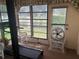 Florida room with treadmill and relaxing seating at 38245 Ironwood Pl # 0, Zephyrhills, FL 33542