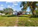 White house with a spacious front yard and walkway at 4024 Grove S St, St Petersburg, FL 33705