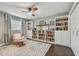 Spacious home office with hardwood floors and built-in shelves at 4320 63Rd N St, Kenneth City, FL 33709