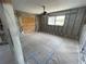Under renovation bedroom with new tile floors and exposed framing at 4902 31St S Ave # 117, Gulfport, FL 33707