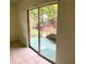 View from sliding glass door to a patio area at 4902 31St S Ave # 117, Gulfport, FL 33707