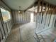 Under renovation kitchen with new tile floor and exposed framing at 4902 31St S Ave # 117, Gulfport, FL 33707