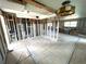 Under renovation kitchen with new tile floor and exposed framing at 4902 31St S Ave # 117, Gulfport, FL 33707