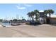 Gulfport Marina entrance with palm trees and boats at 4902 31St S Ave # 117, Gulfport, FL 33707
