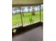 Screened porch with view of backyard and water at 4902 31St S Ave # 117, Gulfport, FL 33707