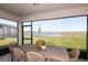 Relaxing screened patio overlooking a tranquil lake at 5309 Wolf Creek Dr, Apollo Beach, FL 33572