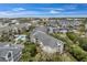Aerial view of condo community with pool and boat slips at 5567 Sea Forest Dr # 320, New Port Richey, FL 34652