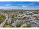 Aerial view of waterfront community with boat slips and coastal homes at 5567 Sea Forest Dr # 320, New Port Richey, FL 34652