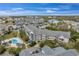 Aerial view of waterfront community with pool and marina at 5567 Sea Forest Dr # 320, New Port Richey, FL 34652