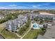 Aerial view of condo community with pool and parking at 5567 Sea Forest Dr # 320, New Port Richey, FL 34652