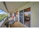Private balcony offering outdoor furniture and serene views at 5567 Sea Forest Dr # 320, New Port Richey, FL 34652