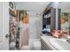 Updated bathroom with a tub/shower combo and stylish decor at 5567 Sea Forest Dr # 320, New Port Richey, FL 34652