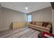 Cozy bedroom with dresser, sofa, and wood-look flooring at 5567 Sea Forest Dr # 320, New Port Richey, FL 34652