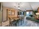 Living room with dining area and access to balcony at 5567 Sea Forest Dr # 320, New Port Richey, FL 34652