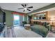 Bright living room featuring a comfy sectional sofa and a large mirror at 5567 Sea Forest Dr # 320, New Port Richey, FL 34652