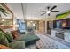 Open living area showcasing a sectional sofa and views into the dining area at 5567 Sea Forest Dr # 320, New Port Richey, FL 34652