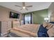 Bright main bedroom with king-size bed and sliding door to balcony at 5567 Sea Forest Dr # 320, New Port Richey, FL 34652
