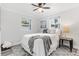 Main bedroom with a queen-size bed and gray accents at 5636 14Th N Ave, St Petersburg, FL 33710