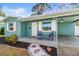 Newly renovated light blue home with a covered porch and walkway at 5636 14Th N Ave, St Petersburg, FL 33710