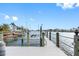 Private dock with boat lift and waterfront access at 565 115Th Ave, Treasure Island, FL 33706